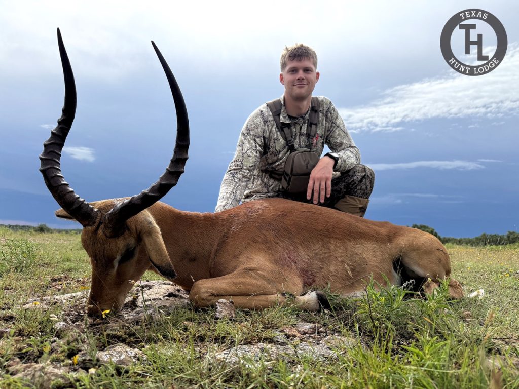 Hunter with an Impala ram at Texas Hunt Lodge in the Texas Hill Country, May 2026