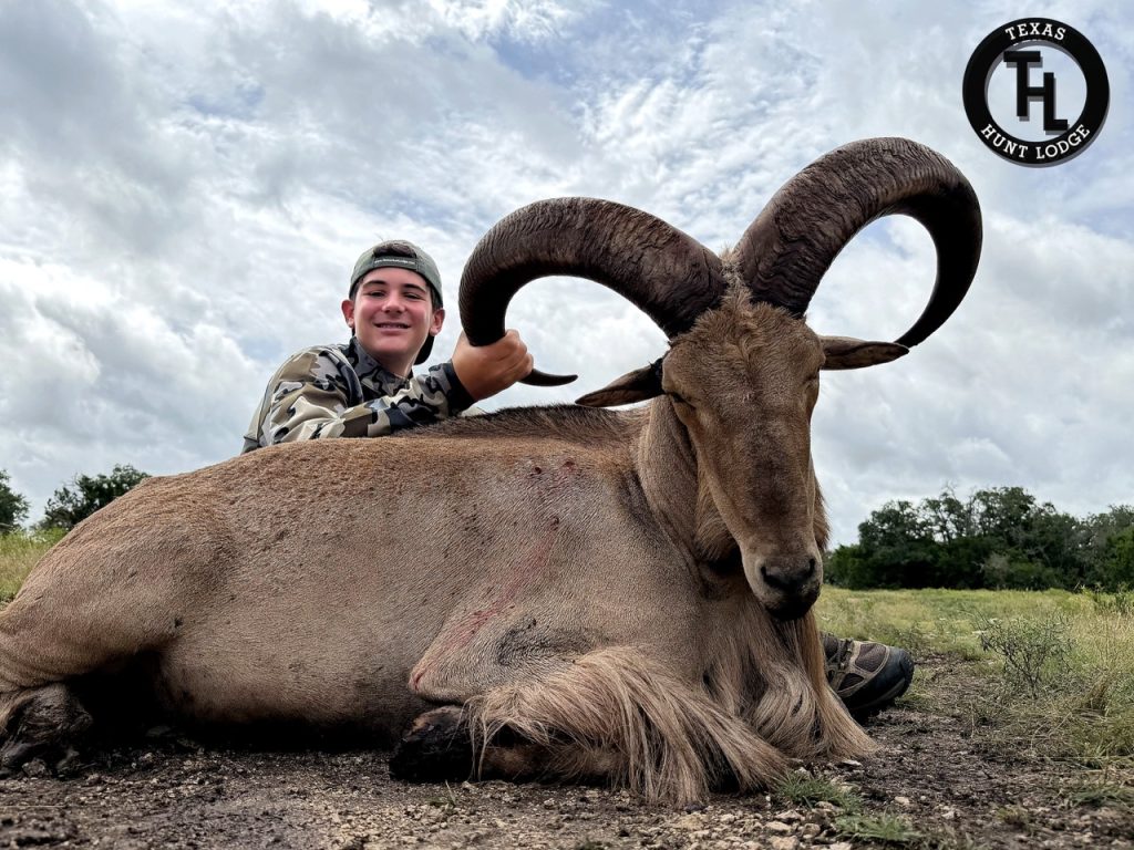 Hunter with a record class Aoudad ram harvested at Texas Hunt Lodge in the Texas Hill Country
